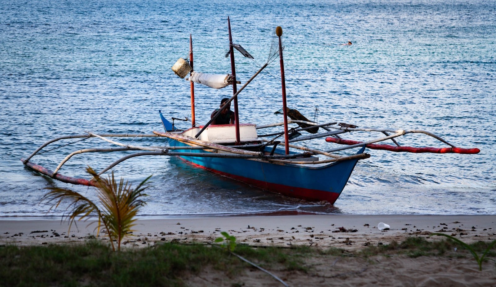 Small charter fishing boat running offshore